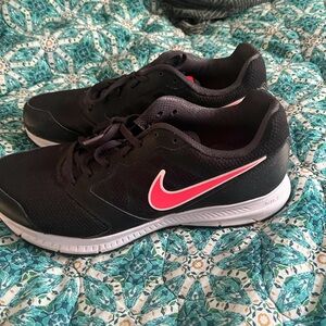 Ladies Nike Black Sneakers with coral swoosh Accents